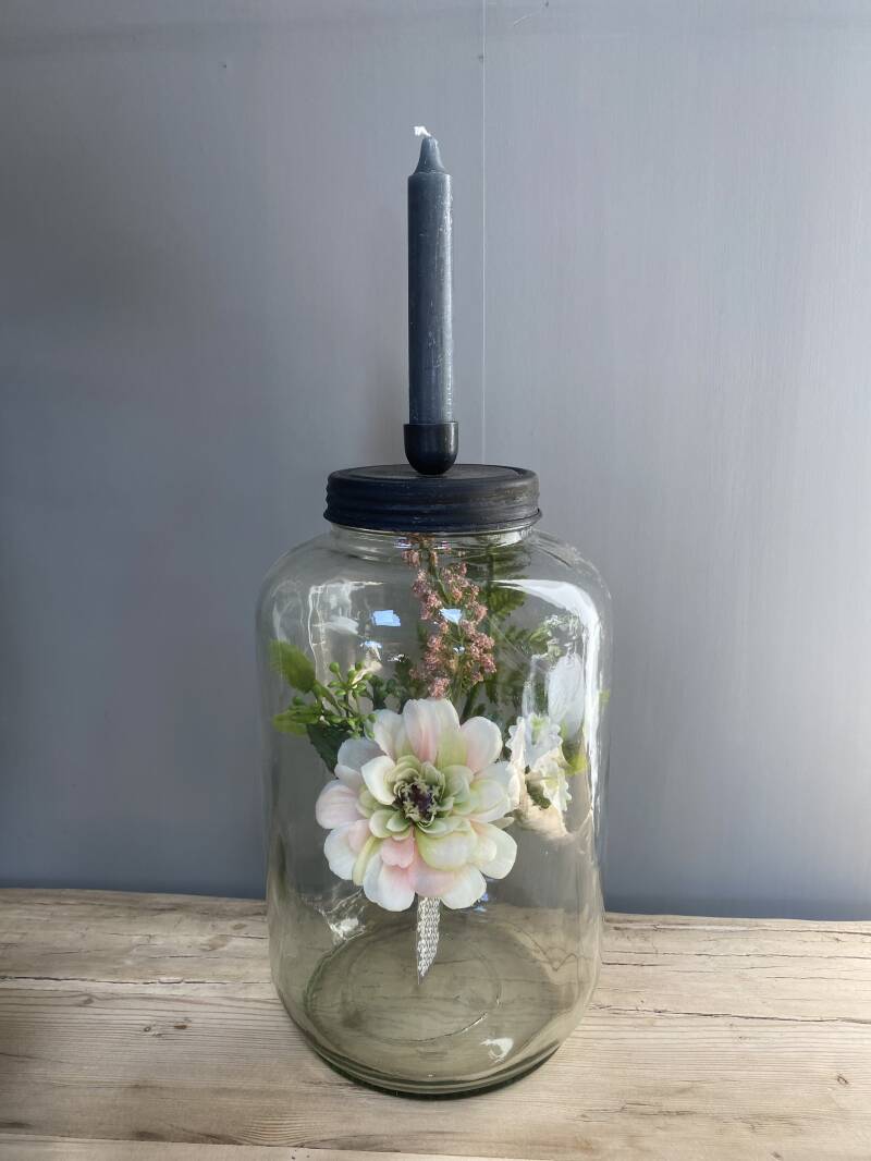 Glazen voorraadpot met kaarsenhouder in deksel